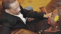 Honeydripperweb Slick,” played by Eric Wood, comforts “Bertha Mae,” played by Mari Harris, in Honeydripper. Photo by Jeffrey Fortson